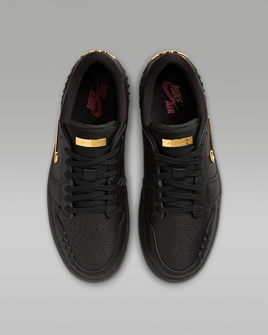 Nike women black and gold online